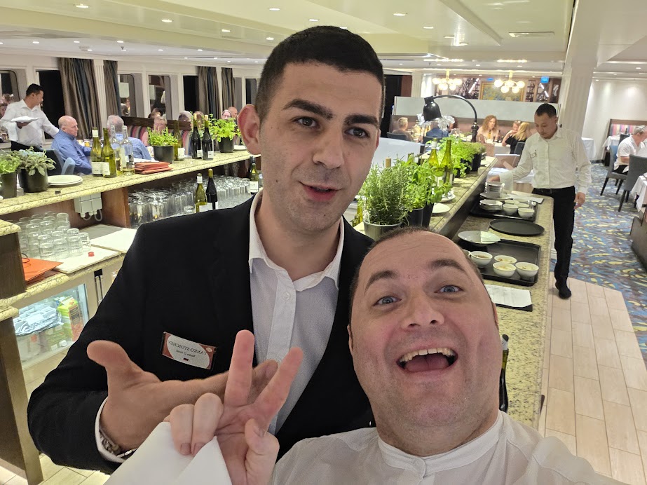 Dining area and crew onboard a European river cruise ship showing the onboard experience and service