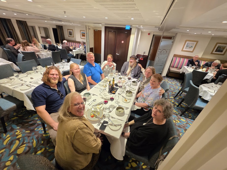 Group dinner onboard a European river cruise ship enjoying dining and wine during a river cruise through Europe