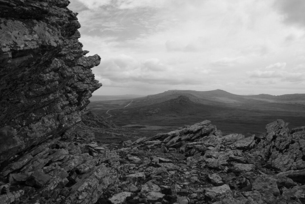 Ancient Scottish moorland stretching to the horizon — the kind of landscape that makes you understand exactly why Outlander was filmed here